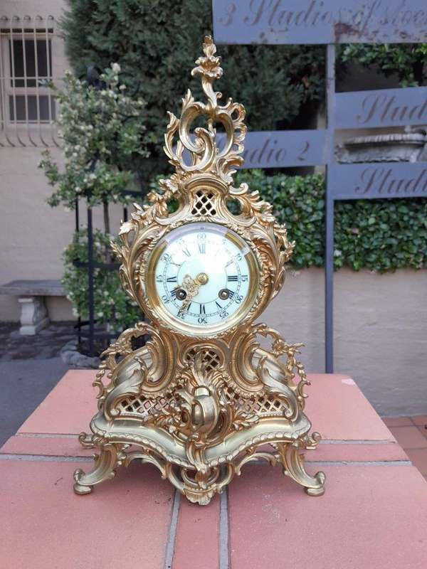 An Antique 19th Century French Rococo Gilt Ormolu Clock Garniture Set with a  Pair of Matching C...