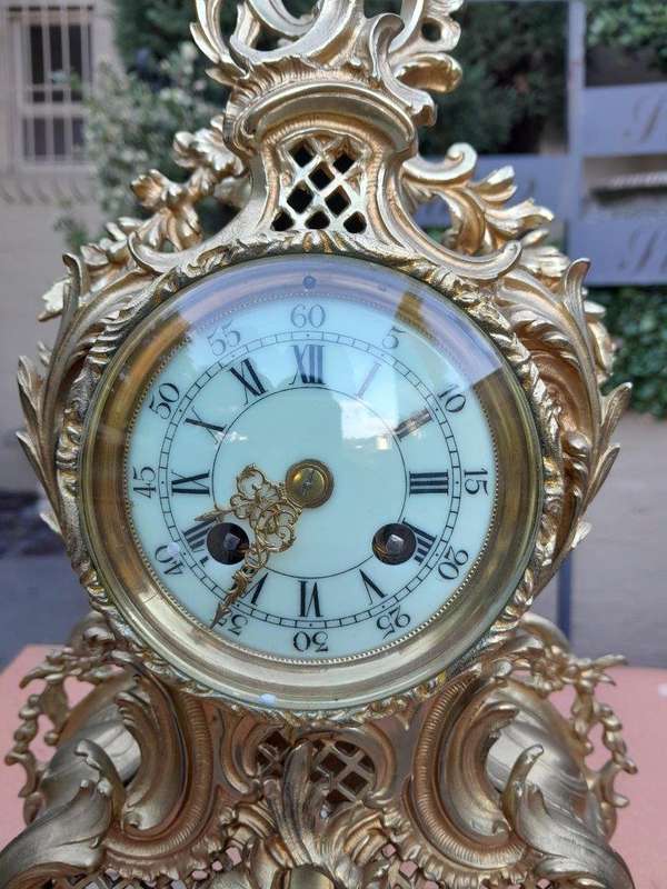 An Antique 19th Century French Rococo Gilt Ormolu Clock Garniture Set with a  Pair of Matching C...