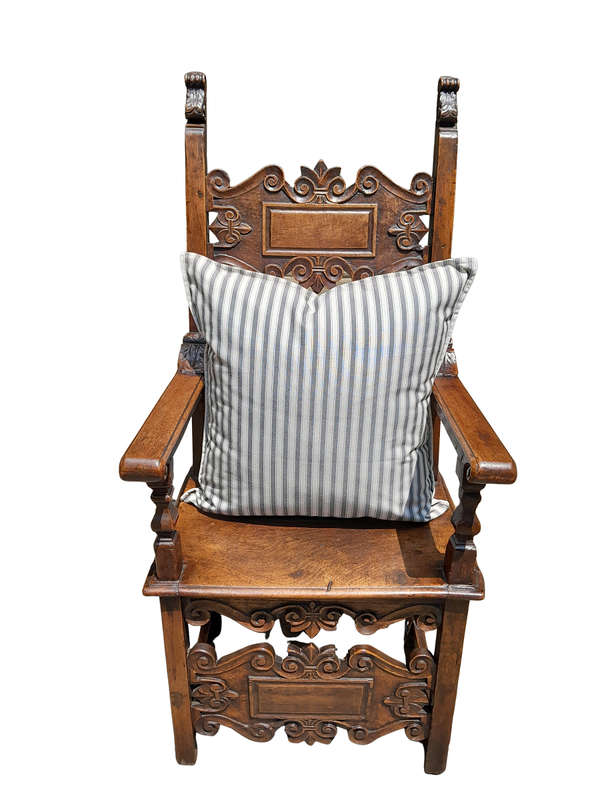 A Grey & White Stripped Cushion