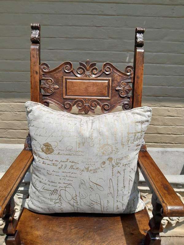 A Cream & Journal Script Cushion