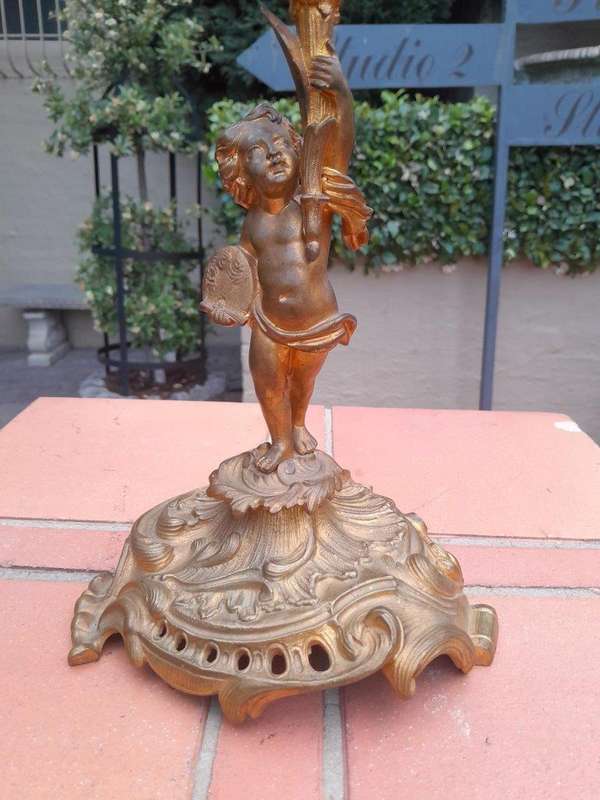 A 20th Century Pair of Gilt Metal Candelabra