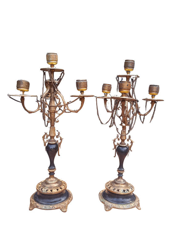 A Pair of Brass and Composite Candelabra