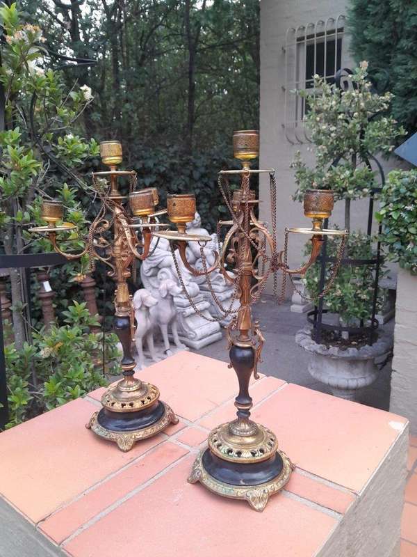 A Pair of Brass and Composite Candelabra