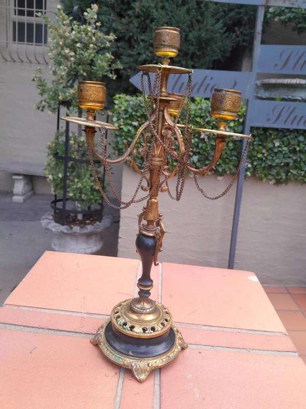 A Pair of Brass and Composite Candelabra