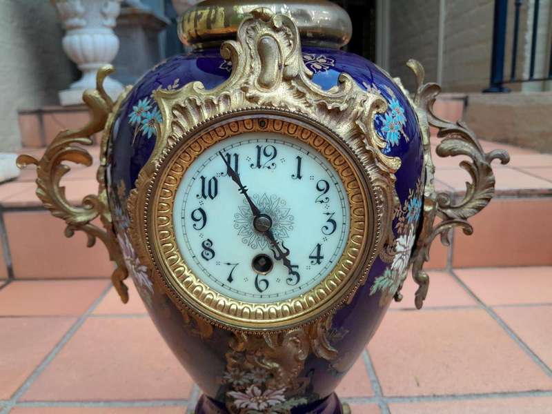 An Early 20th Century (Circa 1911) French Rococo Style Clock Garniture Set With Gilt Metal Mounts...