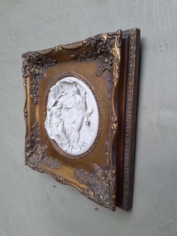 A 20TH Century Ornately Gilt Framed Cast Composite Marble Plaque