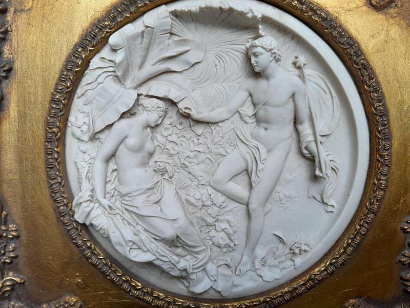 A 20TH Century Ornately Gilt Framed Cast Composite Marble Plaque