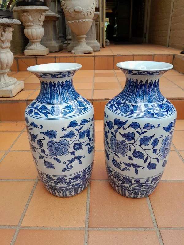 A 20th Century Pair of Blue / White Painted Ceramic Vases