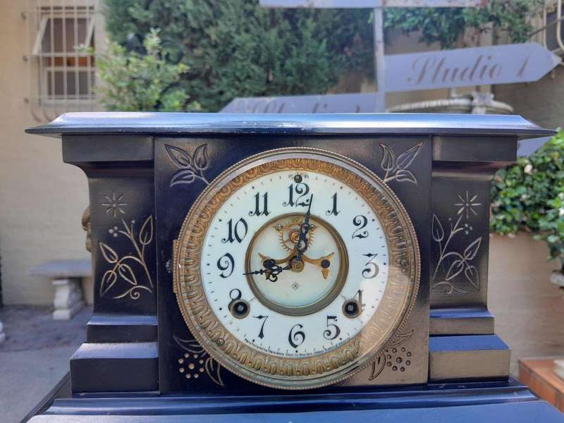 An Antique Victorian Ansonia Gilt Metal, Black Lacquer Chiming Working Clock with Key