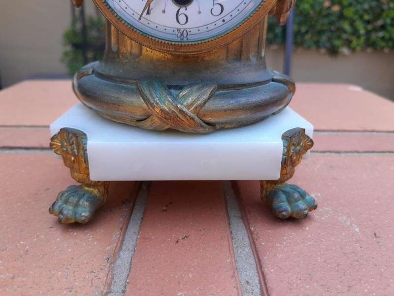 An Antique19th Century French Gilt Bronze Clock with Enamel Dial