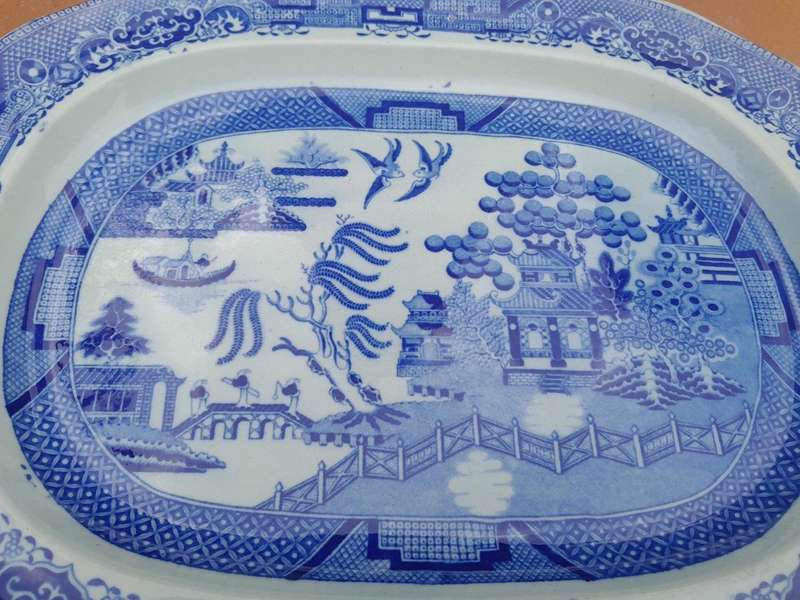An Antique Blue and White Willow Pattern Porcelain Platter