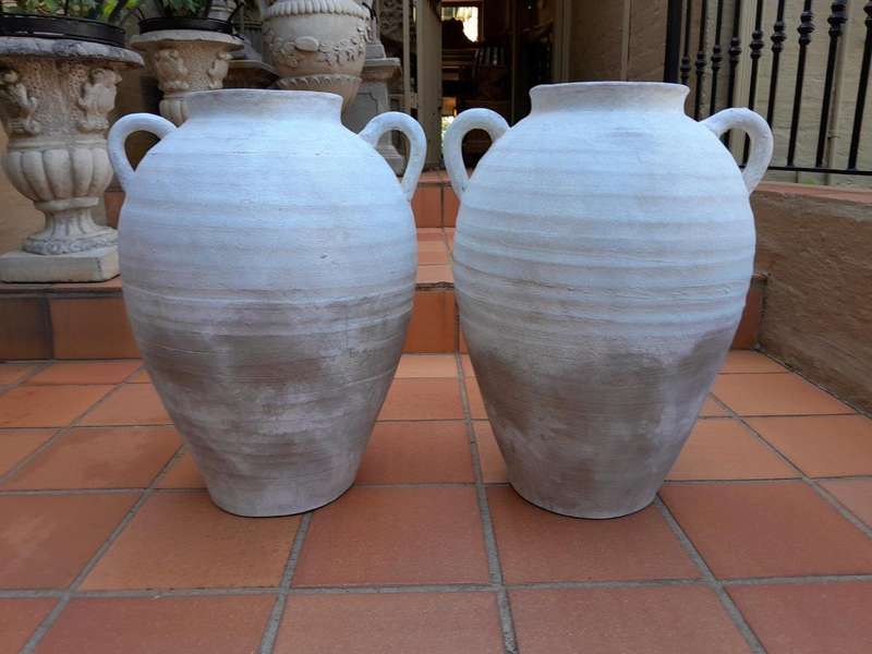 A Pair Of Cement Urns Of Large Proportion With Handles