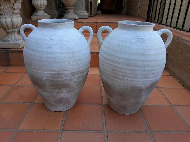 A Pair Of Cement Urns Of Large Proportion With Handles