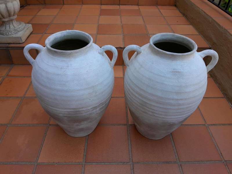 A Pair Of Cement Urns Of Large Proportion With Handles