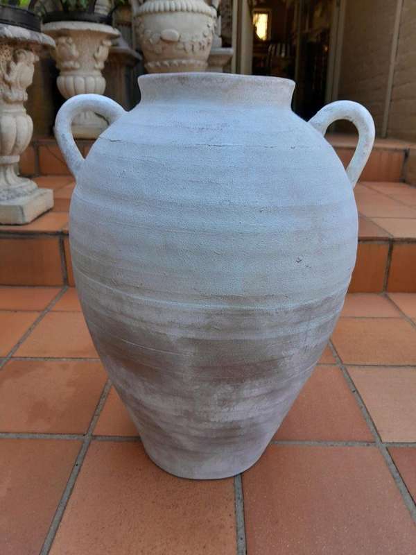 A Pair Of Cement Urns Of Large Proportion With Handles