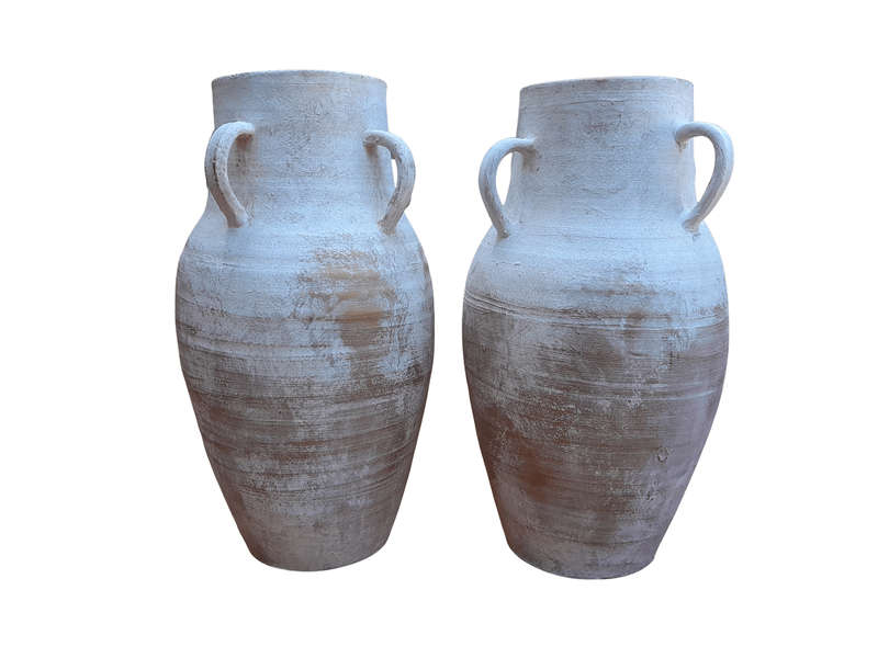 A Decorative Pair Of Cement Urns Of Large Proportion With Handles