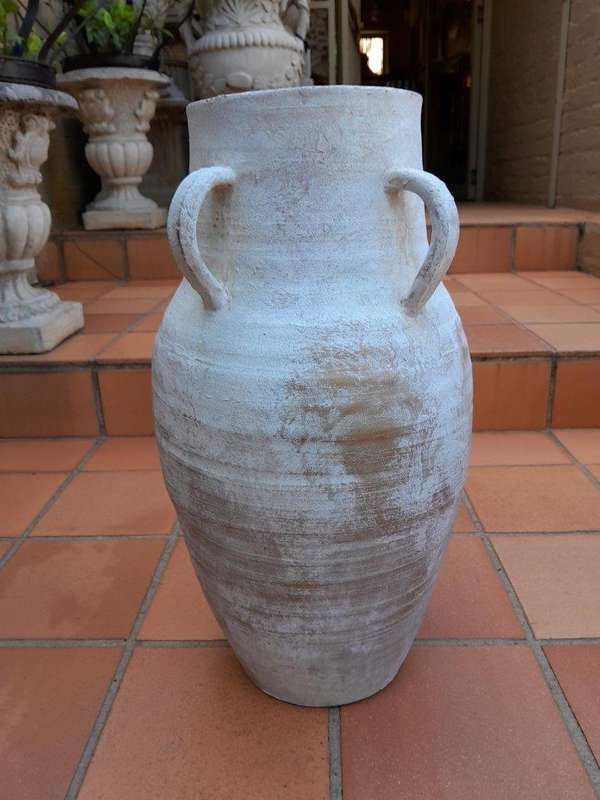 A Decorative Pair Of Cement Urns Of Large Proportion With Handles