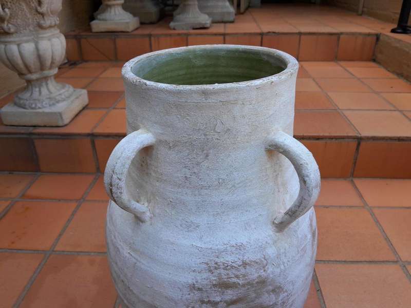 A Decorative Pair Of Cement Urns Of Large Proportion With Handles
