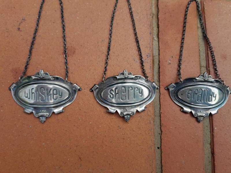 A Mid 20th Century Set of Five Sterling Silver Decanter Labels Brandy Port Sherry Gin Whisky  We...