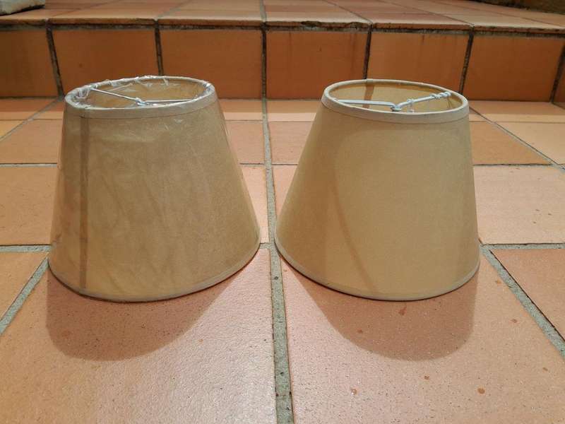 A 20th Century Pair Of Handmade Parchment Lampshades With Gold Painted Trim
