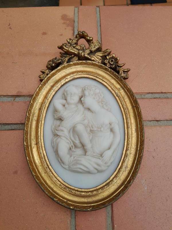 A 20th Century Carved Marble Plaque in a Gilt Frame