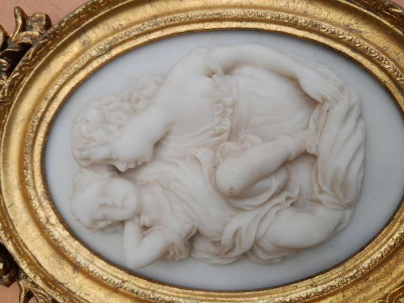 A 20th Century Carved Marble Plaque in a Gilt Frame