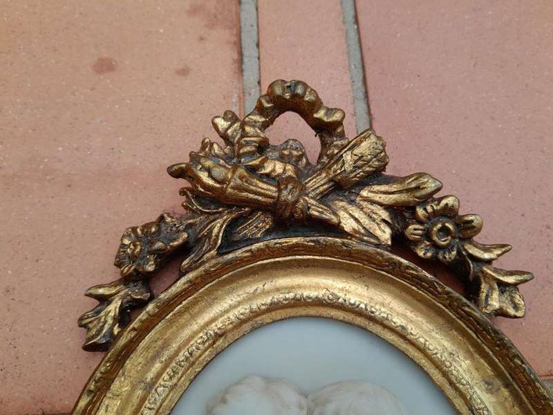 A 20th Century Carved Marble Plaque in a Gilt Frame