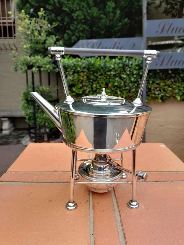 20th Century Tea Kettle on Burner