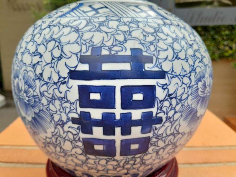 A Blue and White Porcelain Chinese Lidded Jar on Wooden Stand