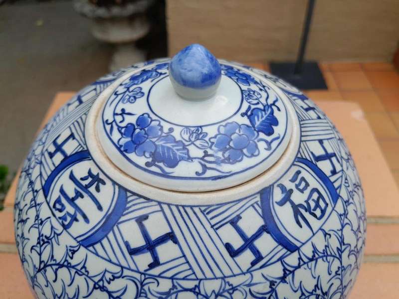 A Blue and White Porcelain Chinese Lidded Jar on Wooden Stand