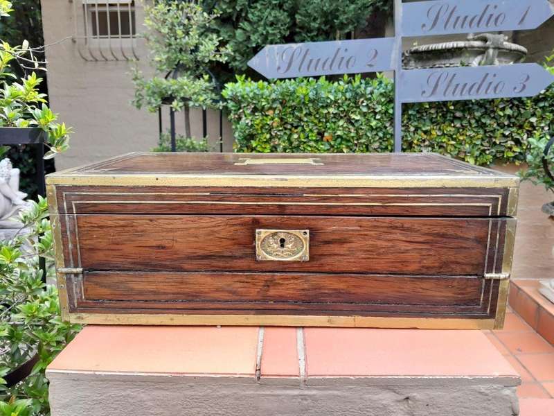 An Antique Victorian Rosewood Writing Slop with Leather Inside and Brass Hardware has Lock and Key