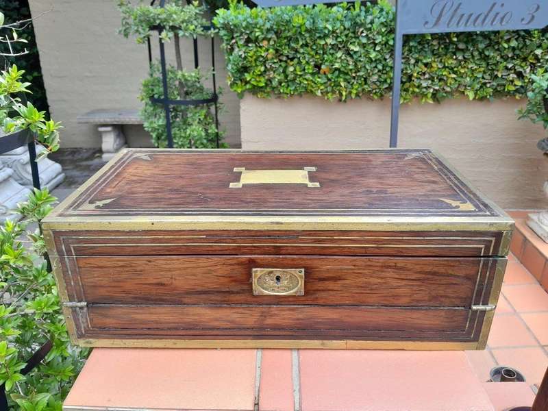 An Antique Victorian Rosewood Writing Slop with Leather Inside and Brass Hardware has Lock and Key