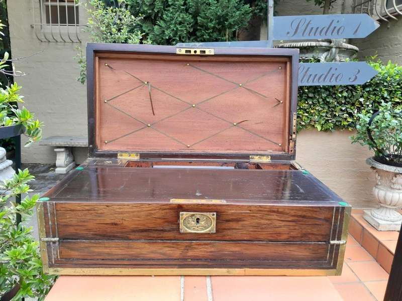 An Antique Victorian Rosewood Writing Slop with Leather Inside and Brass Hardware has Lock and Key