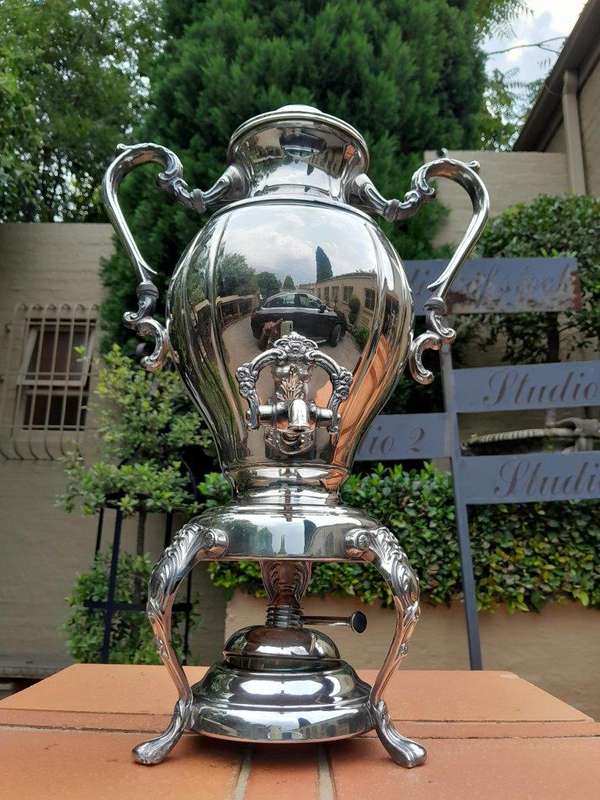 A 20th Century Silver Plate Tea Urn on Stand with Burner