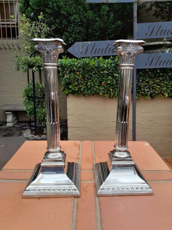 An Antique 19th Century Pair of Corinthian Candlesticks / Holders