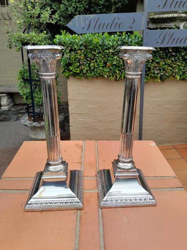 An Antique 19th Century Pair of Corinthian Candlesticks / Holders