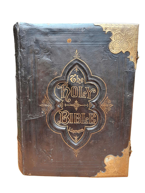 An Antique 19th Century English Leather Bound Bible with Brass Corners