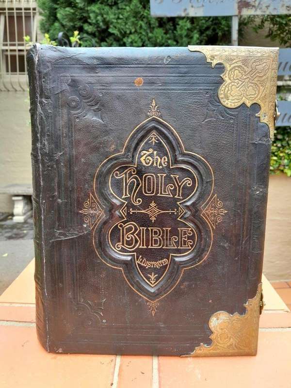 An Antique 19th Century English Leather Bound Bible with Brass Corners