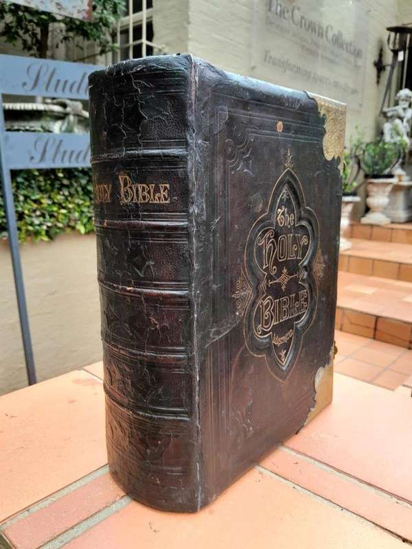 An Antique 19th Century English Leather Bound Bible with Brass Corners