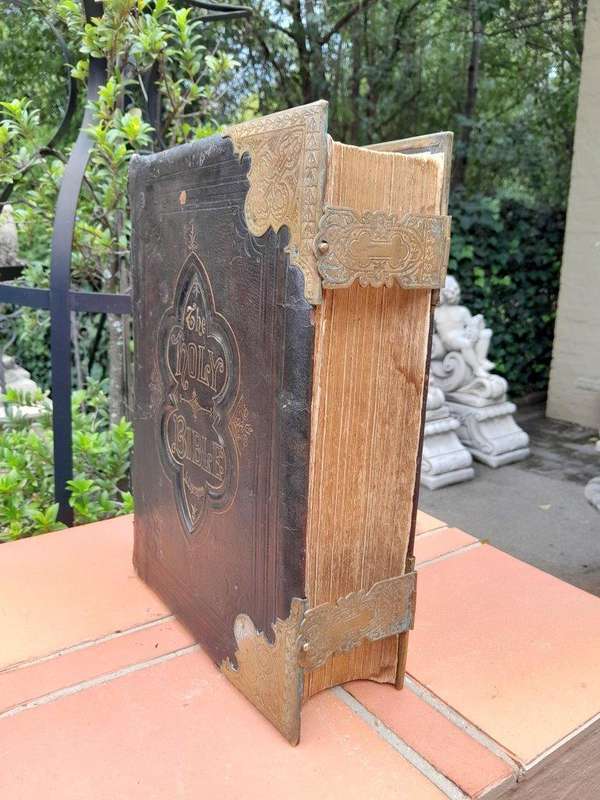 An Antique 19th Century English Leather Bound Bible with Brass Corners