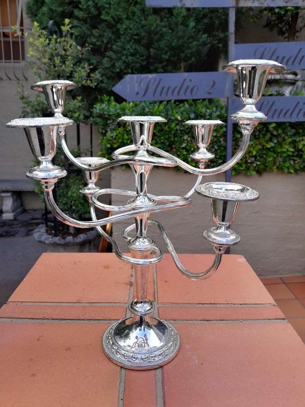 A 20th Century Pair Of Silver Plate Candelabra