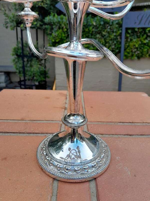 A 20th Century Pair Of Silver Plate Candelabra