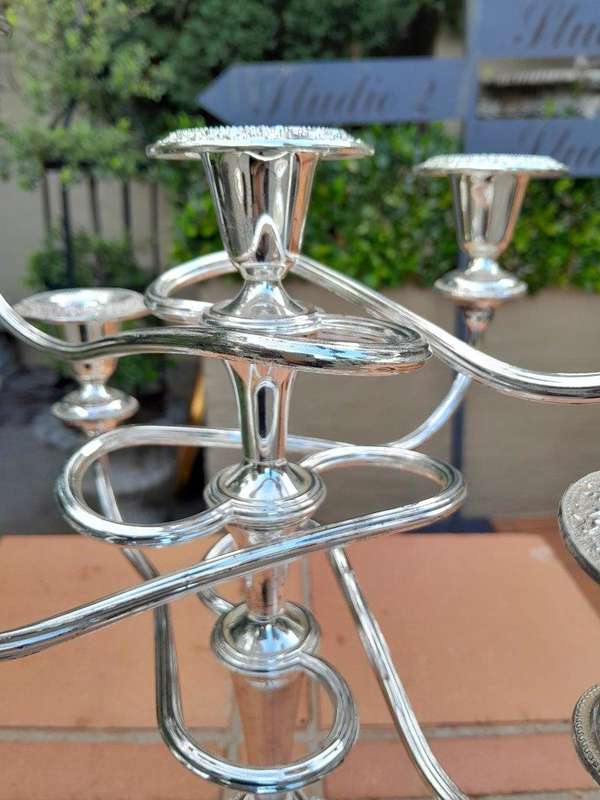 A 20th Century Pair Of Silver Plate Candelabra