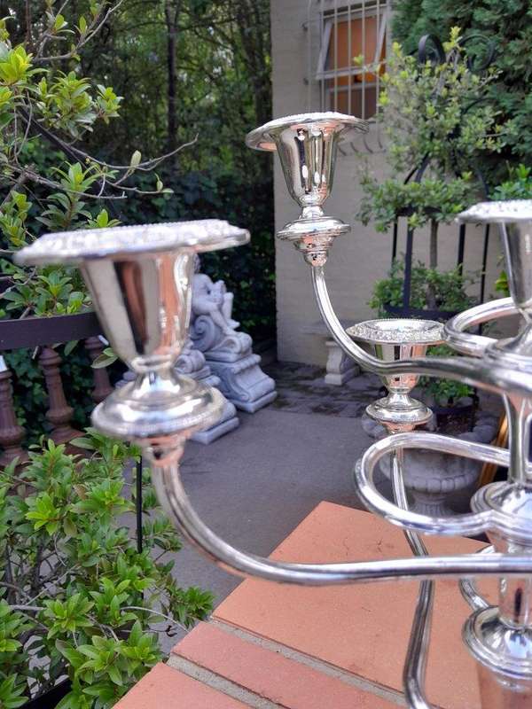 A 20th Century Pair Of Silver Plate Candelabra