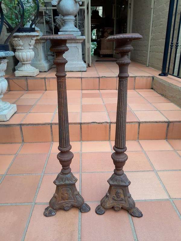 A 20th Century Pair of Cast Iron Candle Holders / Sticks