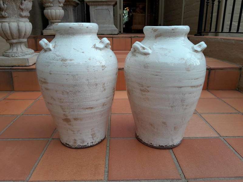 A Pair Of Large Ceramic Two Handled Urns