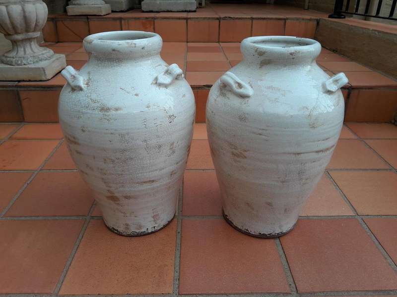 A Pair Of Large Ceramic Two Handled Urns