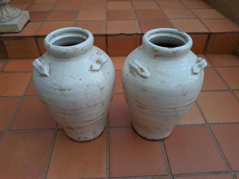 A Pair Of Large Ceramic Two Handled Urns