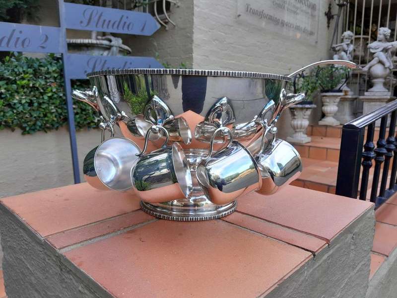 A 20th Century Silver-Plate Punch Bowl With Ladle And Eight Cups