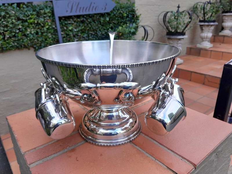 A 20th Century Silver-Plate Punch Bowl With Ladle And Eight Cups
